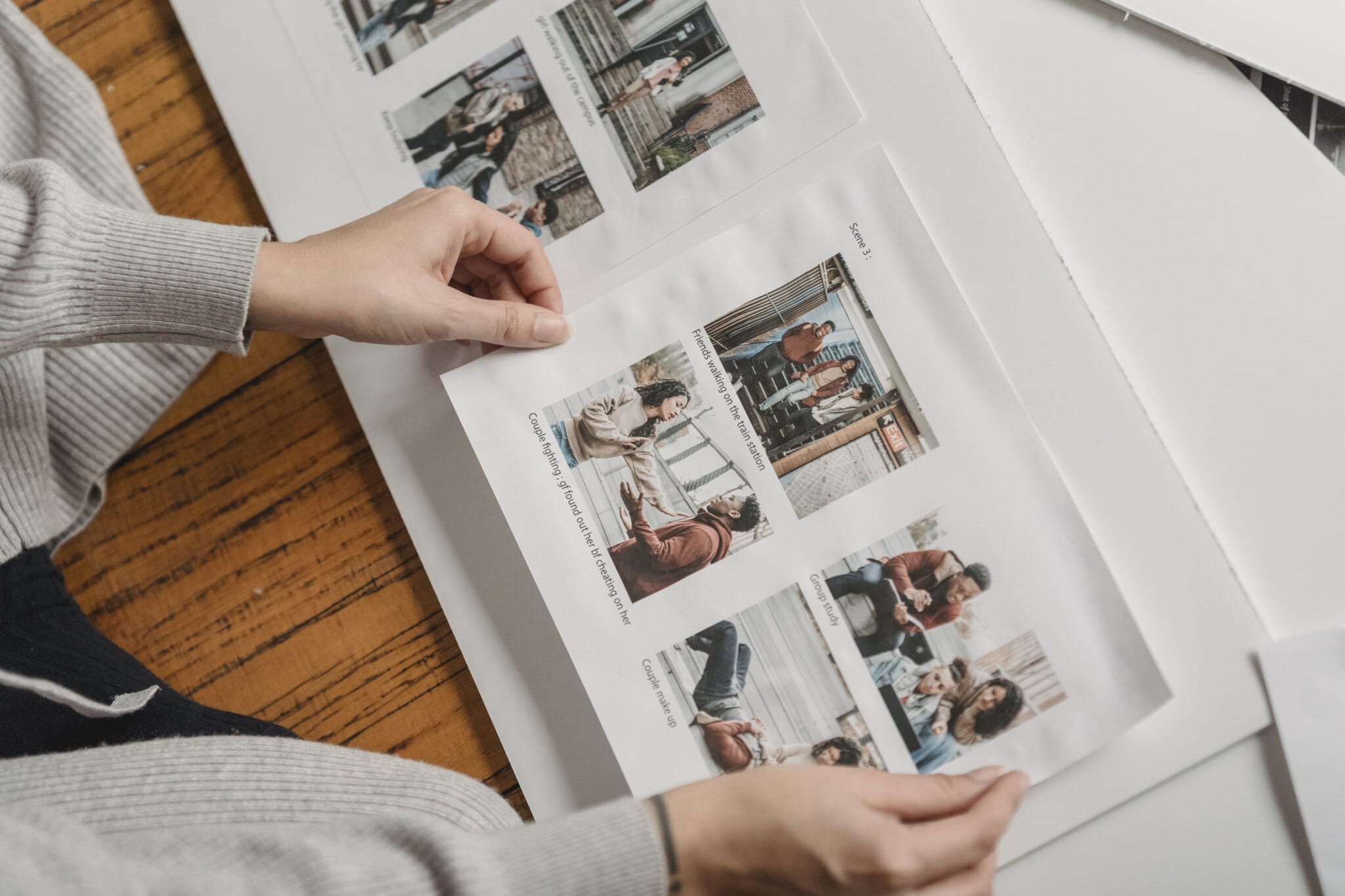 unrecognizable person pasting photos in family album stockpack pexels